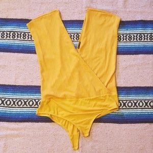 Yellow body suit